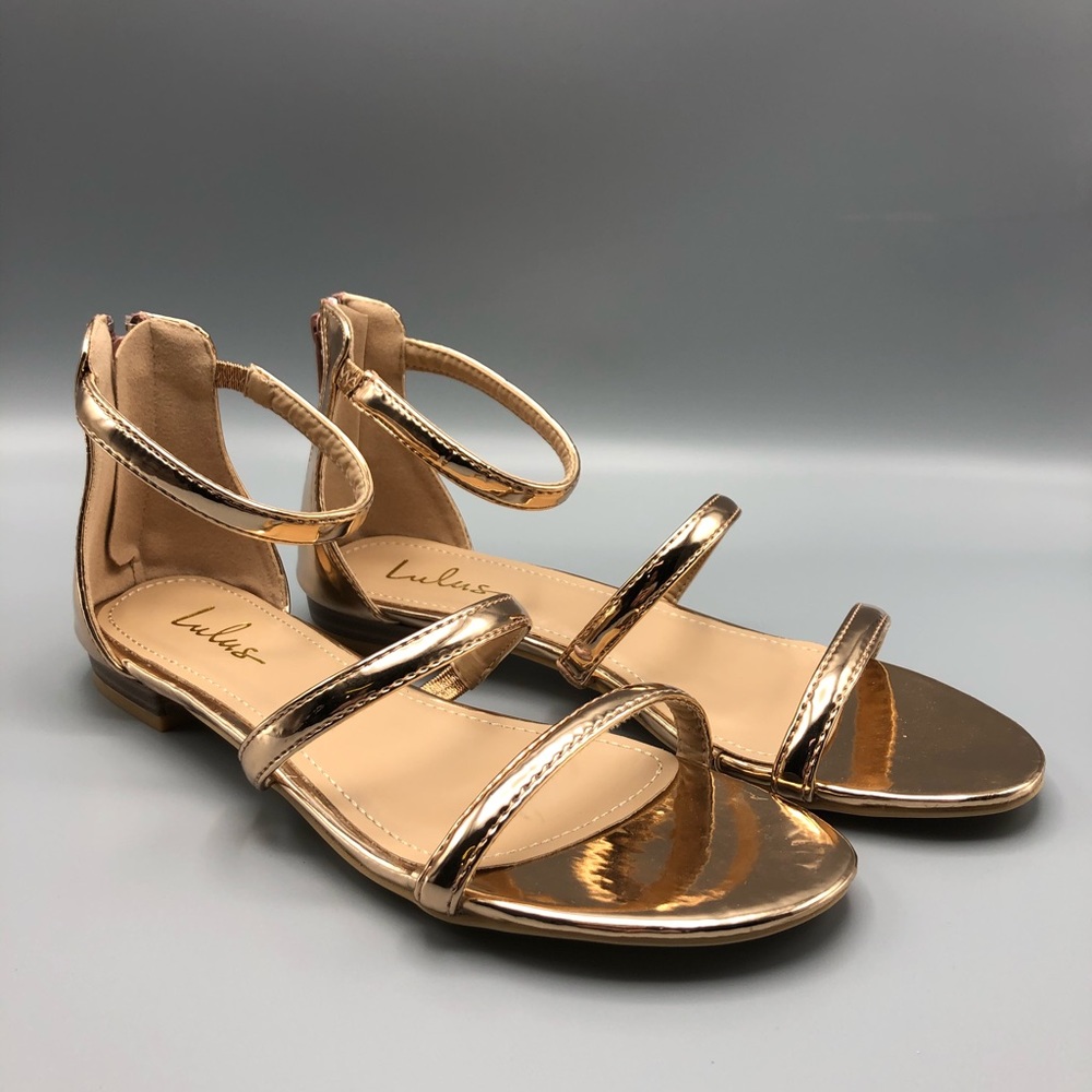 Rose gold flat sandals with straps